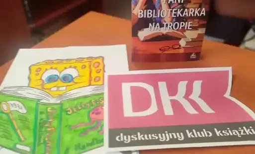 Prezentacja książki wraz z logo DKK i kolorowanką